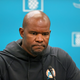 Miami Dolphins head coach Brian Flores talks to the media before an NFL football practice at Baptist Health Training Complex in Hard Rock Stadium in Miami Gardens, Fla., Wednesday, Oct. 6, 2021. Former Miami Dolphins coach Brian Flores filed a class-action lawsuit against the NFL alleging racist hiring practices.